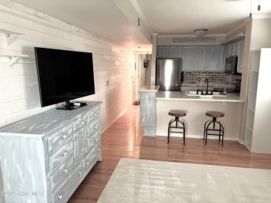 This beautifully updated two-bedroom, two-bath second-floor on Minnesott Golf and Country Club in North Carolina - for sale on GolfHomes.com, golf home, golf lot