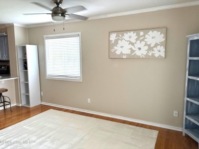 This beautifully updated two-bedroom, two-bath second-floor on Minnesott Golf and Country Club in North Carolina - for sale on GolfHomes.com, golf home, golf lot