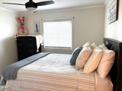 This beautifully updated two-bedroom, two-bath second-floor on Minnesott Golf and Country Club in North Carolina - for sale on GolfHomes.com, golf home, golf lot