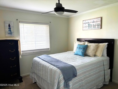 This beautifully updated two-bedroom, two-bath second-floor on Minnesott Golf and Country Club in North Carolina - for sale on GolfHomes.com, golf home, golf lot