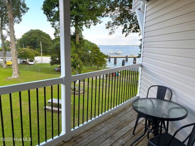 This beautifully updated two-bedroom, two-bath second-floor on Minnesott Golf and Country Club in North Carolina - for sale on GolfHomes.com, golf home, golf lot