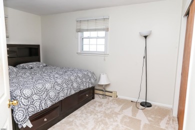 This traditional, split-level home is freshly painted just on The Links At Brigantine Beach in New Jersey - for sale on GolfHomes.com, golf home, golf lot