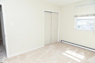 This traditional, split-level home is freshly painted just on The Links At Brigantine Beach in New Jersey - for sale on GolfHomes.com, golf home, golf lot