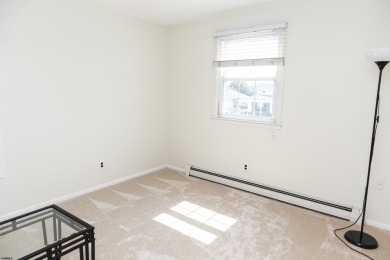 This traditional, split-level home is freshly painted just on The Links At Brigantine Beach in New Jersey - for sale on GolfHomes.com, golf home, golf lot