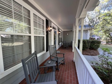 This residence, located within the gated community of Pawleys on Pawleys Plantation Golf and Country Club in South Carolina - for sale on GolfHomes.com, golf home, golf lot