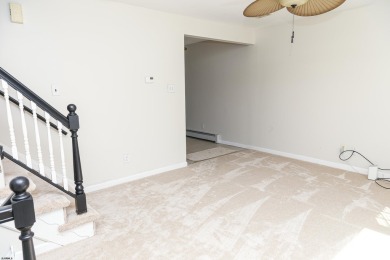This traditional, split-level home is freshly painted just on The Links At Brigantine Beach in New Jersey - for sale on GolfHomes.com, golf home, golf lot