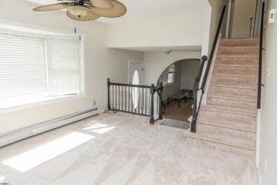 This traditional, split-level home is freshly painted just on The Links At Brigantine Beach in New Jersey - for sale on GolfHomes.com, golf home, golf lot