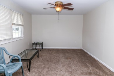 This traditional, split-level home is freshly painted just on The Links At Brigantine Beach in New Jersey - for sale on GolfHomes.com, golf home, golf lot