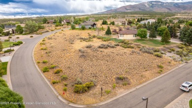 Stunning elevated lot offering breathtaking 360-degree views on Battlement Mesa Golf Course in Colorado - for sale on GolfHomes.com, golf home, golf lot