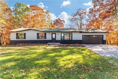 This beautifully remodeled 3 bedroom, 2 bathroom home at Holiday on Holiday Island Golf Course in Arkansas - for sale on GolfHomes.com, golf home, golf lot