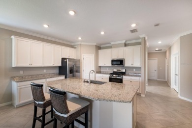 PRICE IMPROVEMENT!  WATERFRONT VILLA IN HIGHLY SOUGHT AFTER on Esplanade Golf and Country at Lakewood Ranch in Florida - for sale on GolfHomes.com, golf home, golf lot