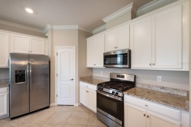 PRICE IMPROVEMENT!  WATERFRONT VILLA IN HIGHLY SOUGHT AFTER on Esplanade Golf and Country at Lakewood Ranch in Florida - for sale on GolfHomes.com, golf home, golf lot