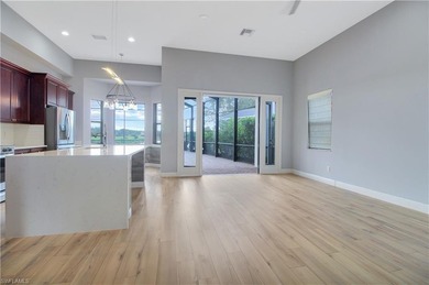 Beautifully Updated Estate Home with Scenic Lake View! This on Valencia Golf and Country Club in Florida - for sale on GolfHomes.com, golf home, golf lot