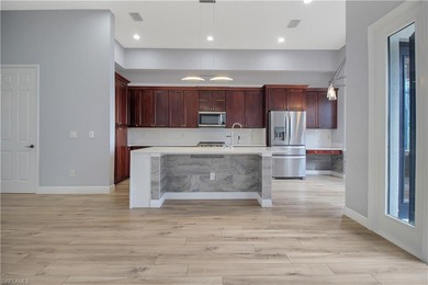 Beautifully Updated Estate Home with Scenic Lake View! This on Valencia Golf and Country Club in Florida - for sale on GolfHomes.com, golf home, golf lot