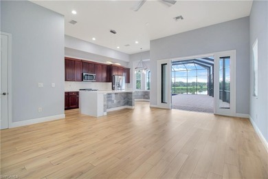 Beautifully Updated Estate Home with Scenic Lake View! This on Valencia Golf and Country Club in Florida - for sale on GolfHomes.com, golf home, golf lot