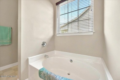 Welcome to 1019 Cherrywood Court, a beautifully cared-for home on Magnolia Greens Golf Plantation in North Carolina - for sale on GolfHomes.com, golf home, golf lot