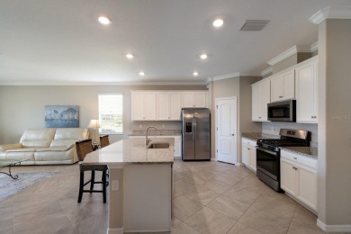 PRICE IMPROVEMENT!  WATERFRONT VILLA IN HIGHLY SOUGHT AFTER on Esplanade Golf and Country at Lakewood Ranch in Florida - for sale on GolfHomes.com, golf home, golf lot