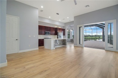 Beautifully Updated Estate Home with Scenic Lake View! This on Valencia Golf and Country Club in Florida - for sale on GolfHomes.com, golf home, golf lot