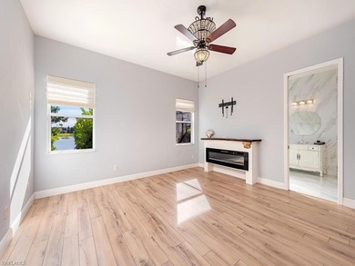 Beautifully Updated Estate Home with Scenic Lake View! This on Valencia Golf and Country Club in Florida - for sale on GolfHomes.com, golf home, golf lot