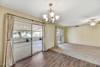 Beautifully updated home in a desirable 55+ community. You'll be on Sun City Lakes West and East in Arizona - for sale on GolfHomes.com, golf home, golf lot