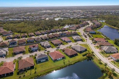 PRICE IMPROVEMENT!  WATERFRONT VILLA IN HIGHLY SOUGHT AFTER on Esplanade Golf and Country at Lakewood Ranch in Florida - for sale on GolfHomes.com, golf home, golf lot