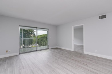 Updated 2 bedroom, 2 bath condo in Century Village in excellent on Flamingo Lakes Country Club in Florida - for sale on GolfHomes.com, golf home, golf lot