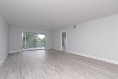 Updated 2 bedroom, 2 bath condo in Century Village in excellent on Flamingo Lakes Country Club in Florida - for sale on GolfHomes.com, golf home, golf lot