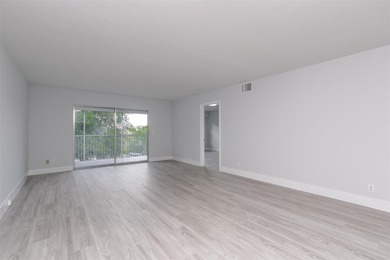 Updated 2 bedroom, 2 bath condo in Century Village in excellent on Flamingo Lakes Country Club in Florida - for sale on GolfHomes.com, golf home, golf lot