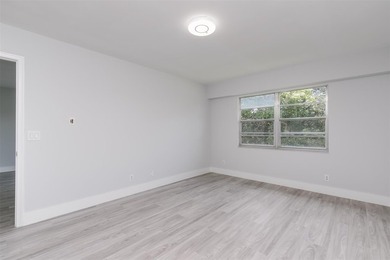 Updated 2 bedroom, 2 bath condo in Century Village in excellent on Flamingo Lakes Country Club in Florida - for sale on GolfHomes.com, golf home, golf lot