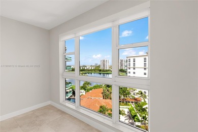 Bright and spacious penthouse in Turnberry Village with soaring on Turnberry Isle Resort and Club in Florida - for sale on GolfHomes.com, golf home, golf lot