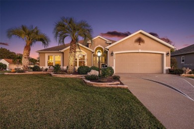 This ONE OF A KIND 3/2 BLOCK  STUCCO Cancun (Oleander) model on The Links of Spruce Creek in Florida - for sale on GolfHomes.com, golf home, golf lot