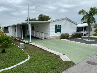 This home stands out from the rest. Three bedrooms, two baths on Sabal Springs Golf and Racquet Club in Florida - for sale on GolfHomes.com, golf home, golf lot