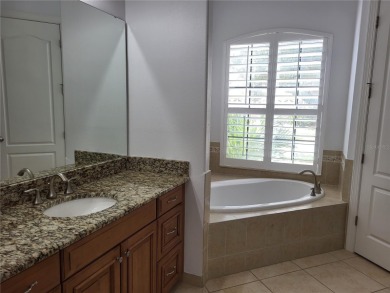 Discover this impressive two-story residence in the highly on Eagle Creek Golf Club in Florida - for sale on GolfHomes.com, golf home, golf lot