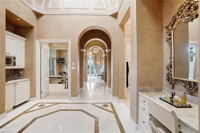 Experience true luxury living on one of the most premier lake on Quail West Golf and Country Club in Florida - for sale on GolfHomes.com, golf home, golf lot