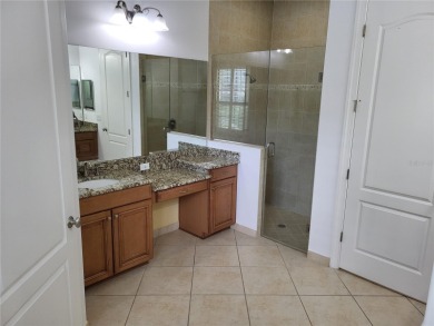 Discover this impressive two-story residence in the highly on Eagle Creek Golf Club in Florida - for sale on GolfHomes.com, golf home, golf lot