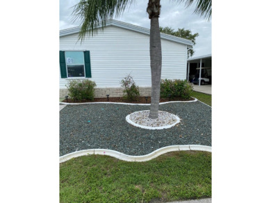 This home stands out from the rest. Three bedrooms, two baths on Sabal Springs Golf and Racquet Club in Florida - for sale on GolfHomes.com, golf home, golf lot