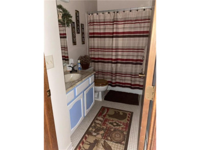 Just a few hours from the Twin Cities, straight up on Hwy 169 on Quadna Mountain Resort Golf Course in Minnesota - for sale on GolfHomes.com, golf home, golf lot