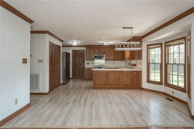 WELCOME TO THIS CHARMING TRADITIONAL 4BED/2.5BA HOME IN on Kings Grant Golf and Country Club in North Carolina - for sale on GolfHomes.com, golf home, golf lot
