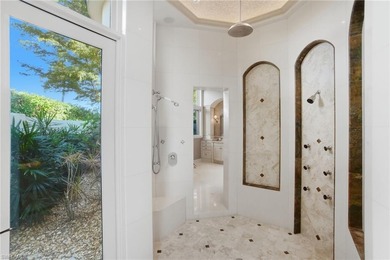 Experience true luxury living on one of the most premier lake on Quail West Golf and Country Club in Florida - for sale on GolfHomes.com, golf home, golf lot