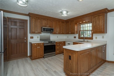 WELCOME TO THIS CHARMING TRADITIONAL 4BED/2.5BA HOME IN on Kings Grant Golf and Country Club in North Carolina - for sale on GolfHomes.com, golf home, golf lot