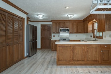 WELCOME TO THIS CHARMING TRADITIONAL 4BED/2.5BA HOME IN on Kings Grant Golf and Country Club in North Carolina - for sale on GolfHomes.com, golf home, golf lot