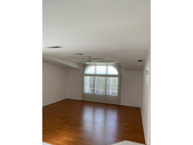 This home stands out from the rest. Three bedrooms, two baths on Sabal Springs Golf and Racquet Club in Florida - for sale on GolfHomes.com, golf home, golf lot