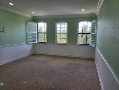 Discover this impressive two-story residence in the highly on Eagle Creek Golf Club in Florida - for sale on GolfHomes.com, golf home, golf lot