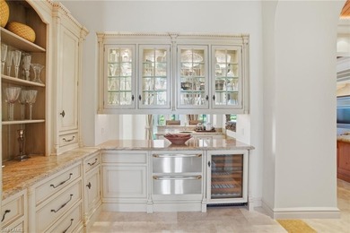 Experience true luxury living on one of the most premier lake on Quail West Golf and Country Club in Florida - for sale on GolfHomes.com, golf home, golf lot