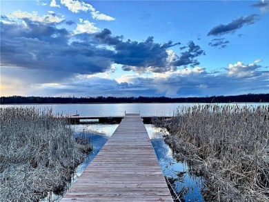 Just a few hours from the Twin Cities, straight up on Hwy 169 on Quadna Mountain Resort Golf Course in Minnesota - for sale on GolfHomes.com, golf home, golf lot