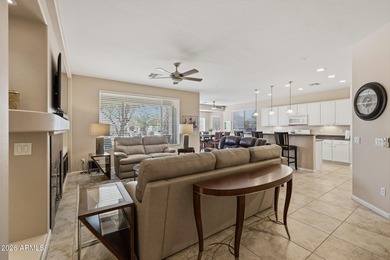 Welcome home to this beautifully upgraded Newport model, nestled on Tuscany Falls At Pebble Creek in Arizona - for sale on GolfHomes.com, golf home, golf lot