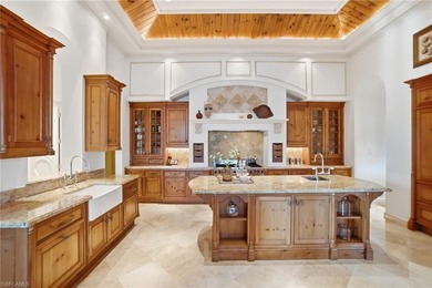 Experience true luxury living on one of the most premier lake on Quail West Golf and Country Club in Florida - for sale on GolfHomes.com, golf home, golf lot