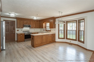 WELCOME TO THIS CHARMING TRADITIONAL 4BED/2.5BA HOME IN on Kings Grant Golf and Country Club in North Carolina - for sale on GolfHomes.com, golf home, golf lot