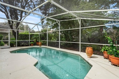 Under contract-accepting backup offers. Beautiful Pool home on Sweetwater Country Club in Florida - for sale on GolfHomes.com, golf home, golf lot