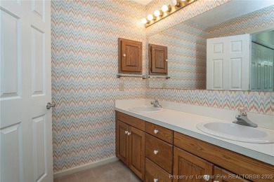 WELCOME TO THIS CHARMING TRADITIONAL 4BED/2.5BA HOME IN on Kings Grant Golf and Country Club in North Carolina - for sale on GolfHomes.com, golf home, golf lot